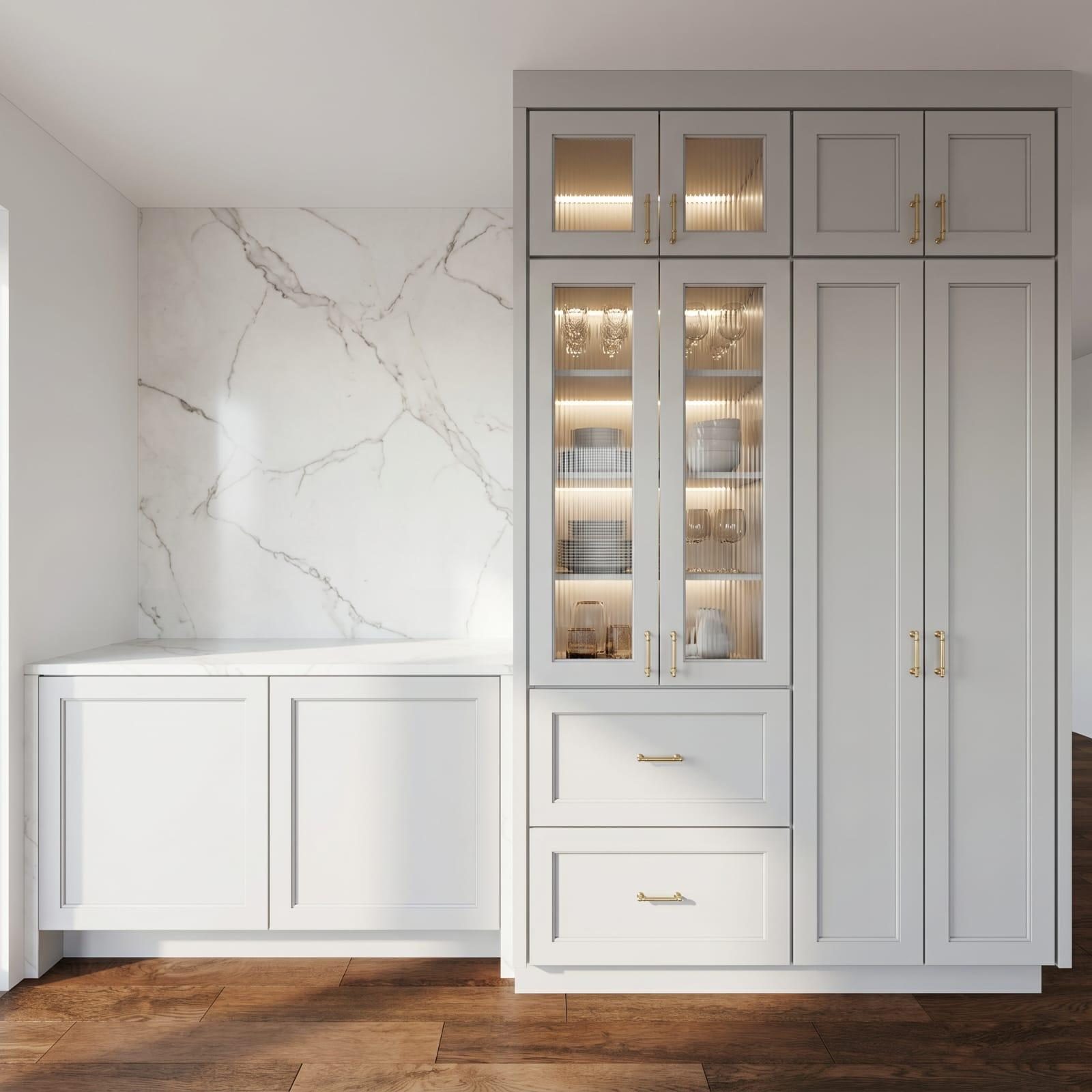 Custom white cabinetry with marble backsplash, glass display and brass hardware