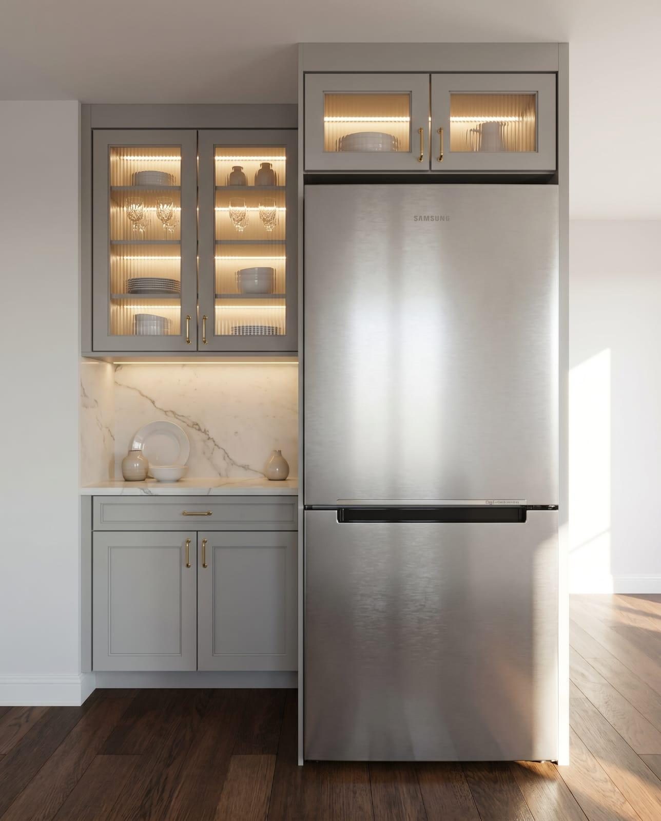 Custom cabinetry with an integrated refrigerator and lit display shelving
