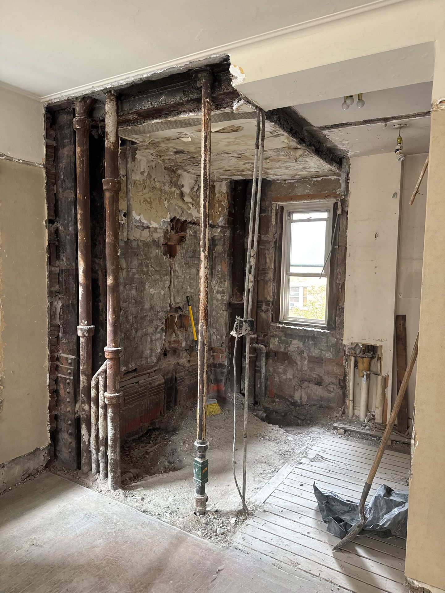 Demolition down to the original brick and framing